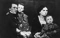 Лев Александрович Блок и Ариадна Александровна Блок (урожденная Черкасова) с детьми — Александром (на руках у отца) и Ольгой. 1860-е годы